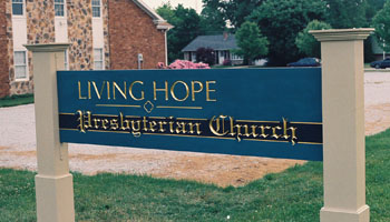 carved church sign