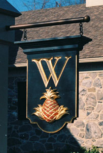carved and gold leafed sign